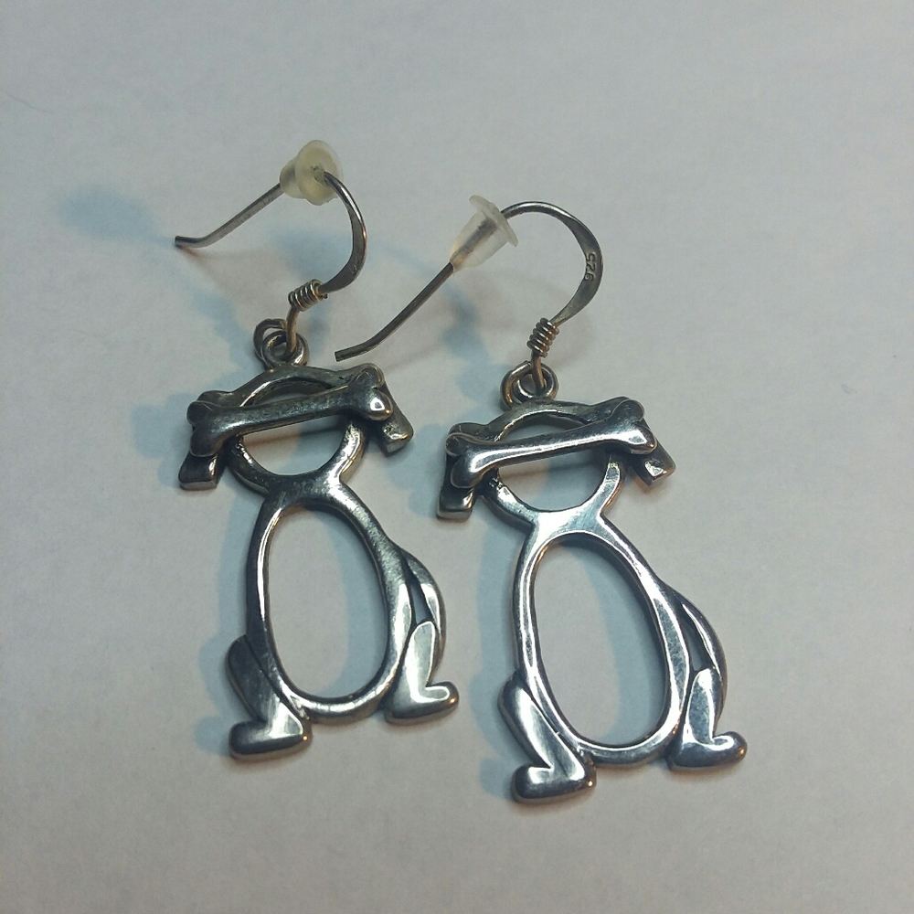 Dog with bone earings